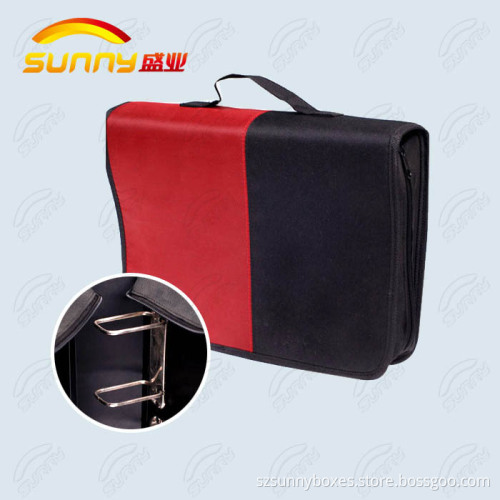 Plastic ring binder with snap closure